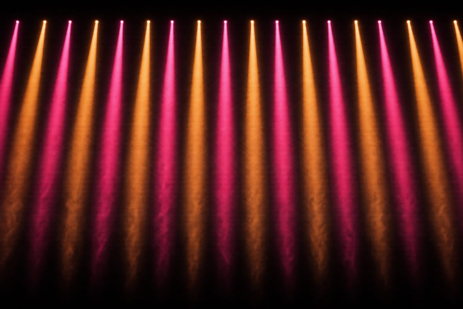 Many thin parallel shafts of magenta and amber light standing side by side in haze, like a row of entries in an index.