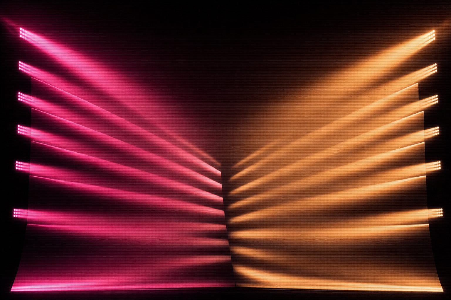 Shafts of hard magenta and amber light through heavy haze, forming legible columns like the pages of an open book.