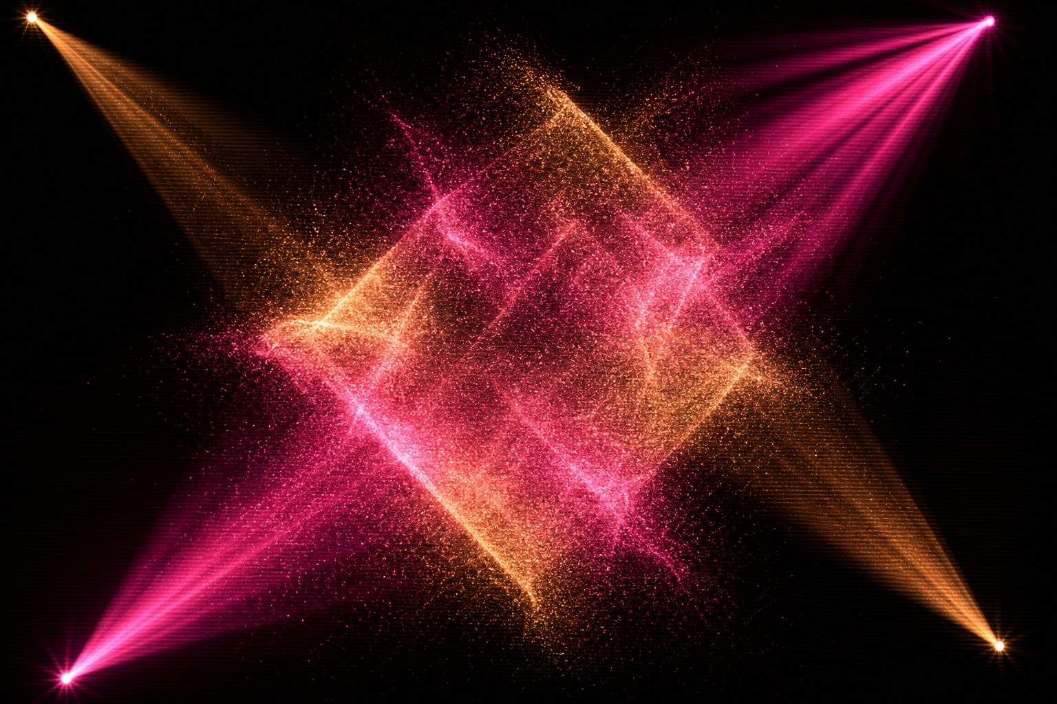 A real-time particle field forming and dissolving a soft geometric shape in magenta and amber.